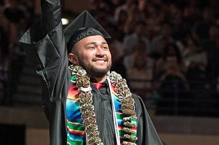 man in graduation cap and gown